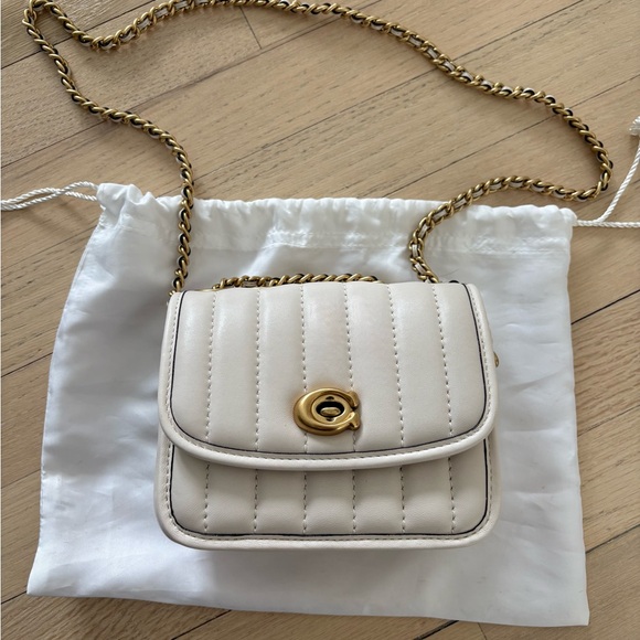 Coach Handbags - Coach Cream Quilted Crossbody Bag with Gold Chain